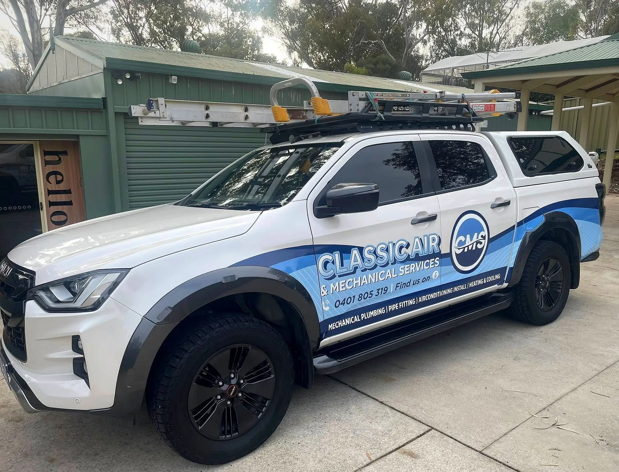 The signwritten Classic Air and Mechanical Services work ute, ready for jobs across Adelaide