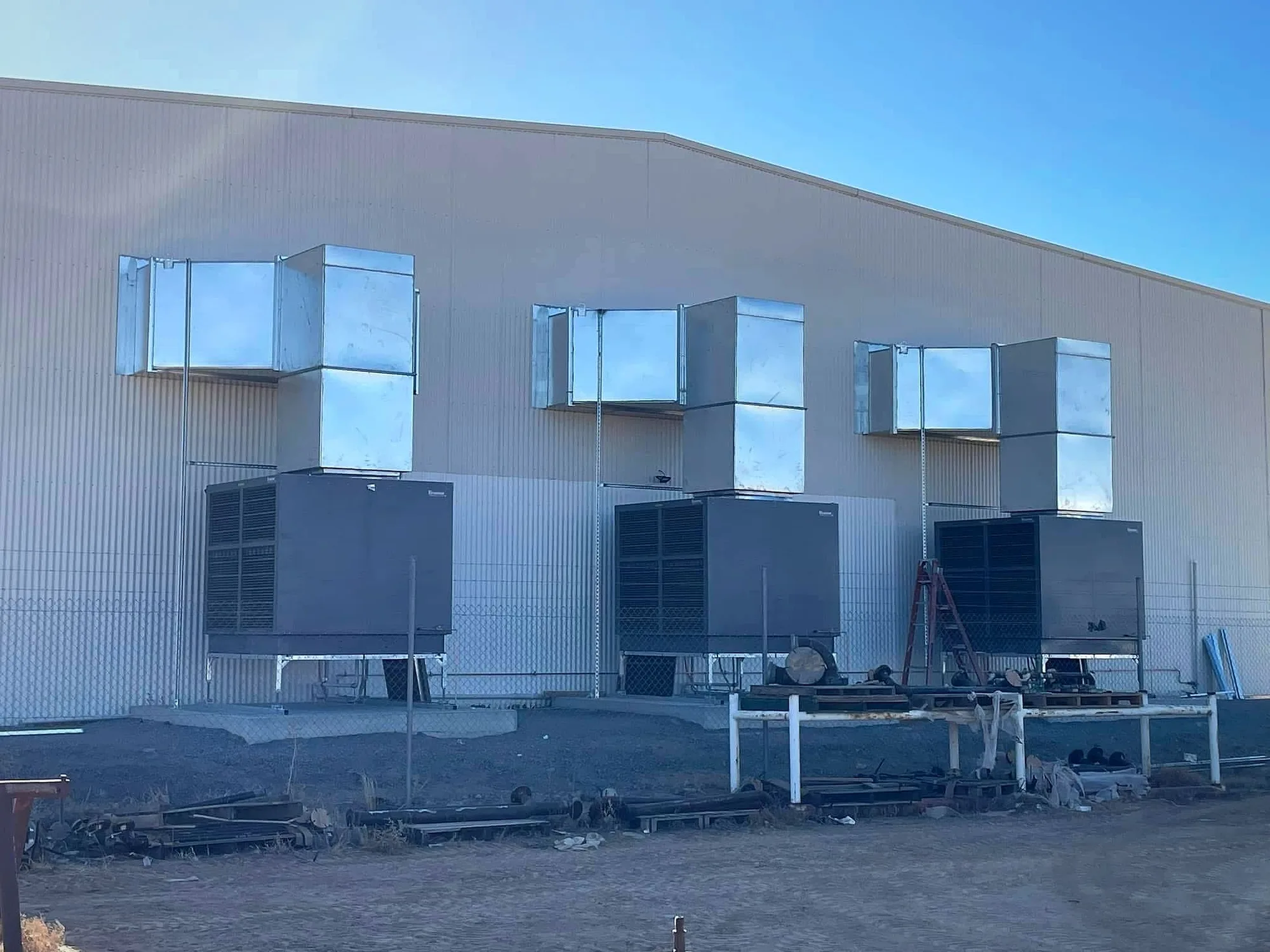 Air conditioning units on a commercial warehouse installed by Classic Air and Mechanical Services